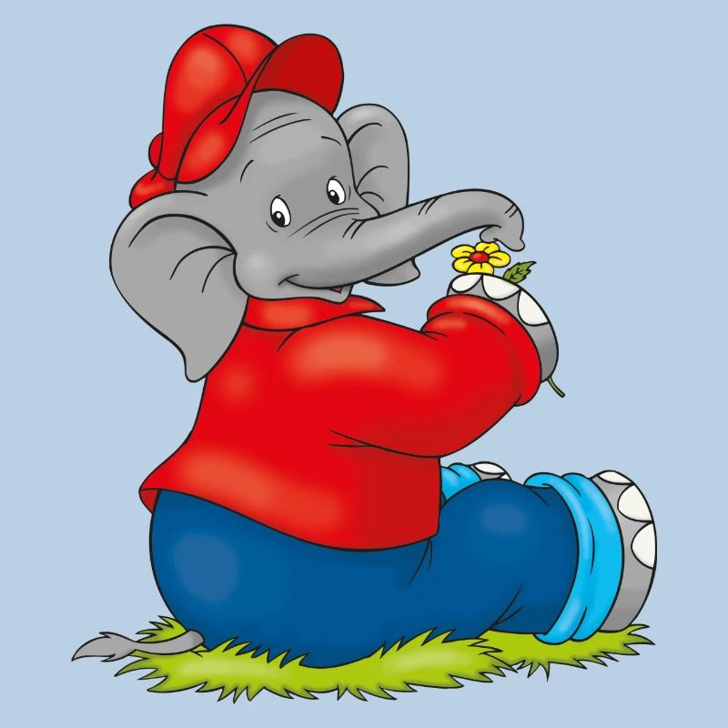 Benjamin Blümchen sitzt auf der Wiese