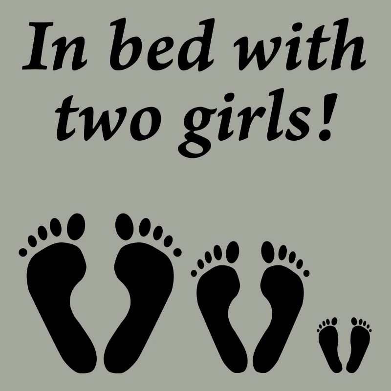 In bed with two girls