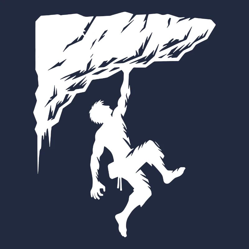 Man free climbing on overhang rocks