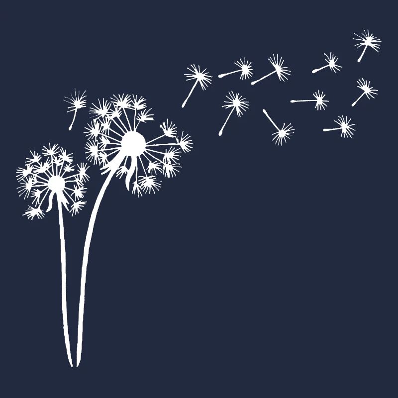 White dandelion in the wind