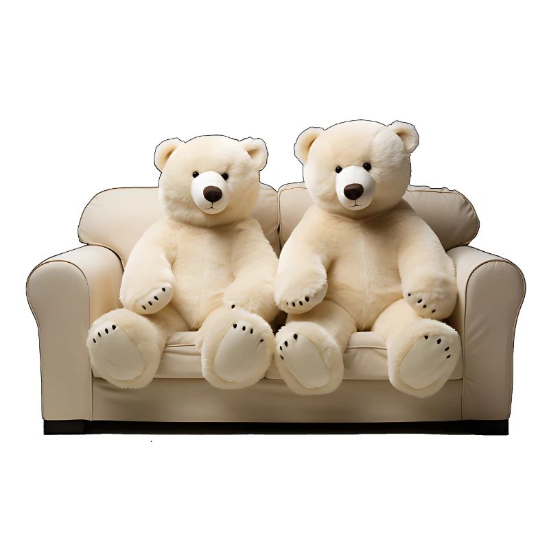 Zwei glückliche Eis-Teddybären auf dem Sofa