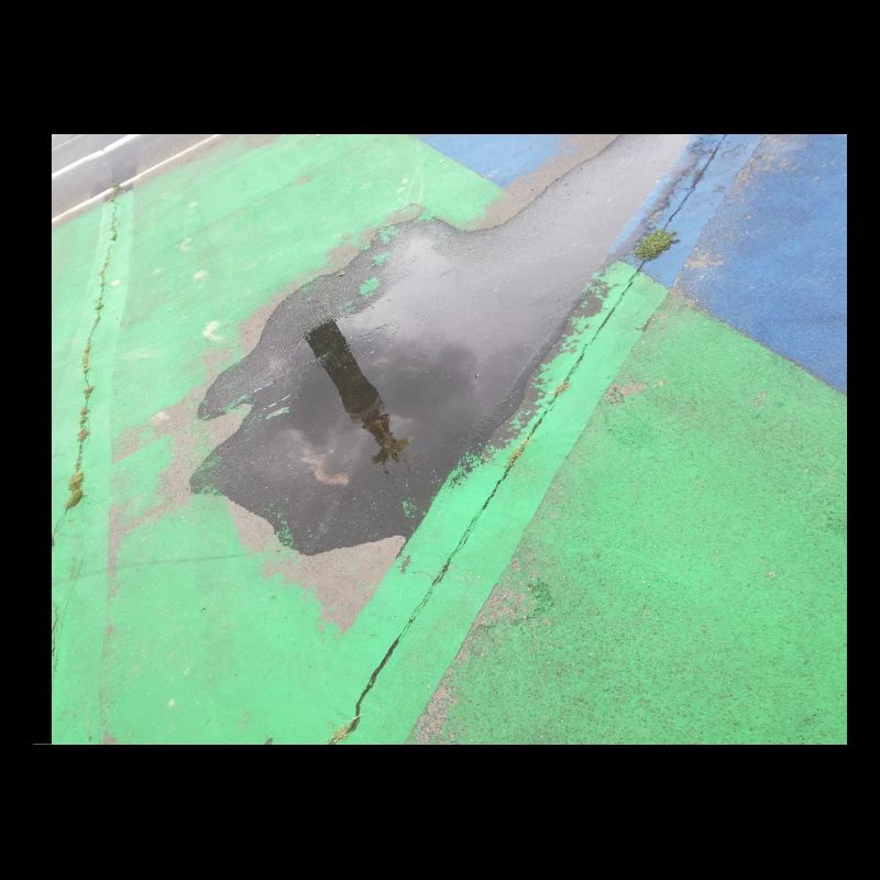 CSD Berlin (mirrored Victory Column in the puddle)