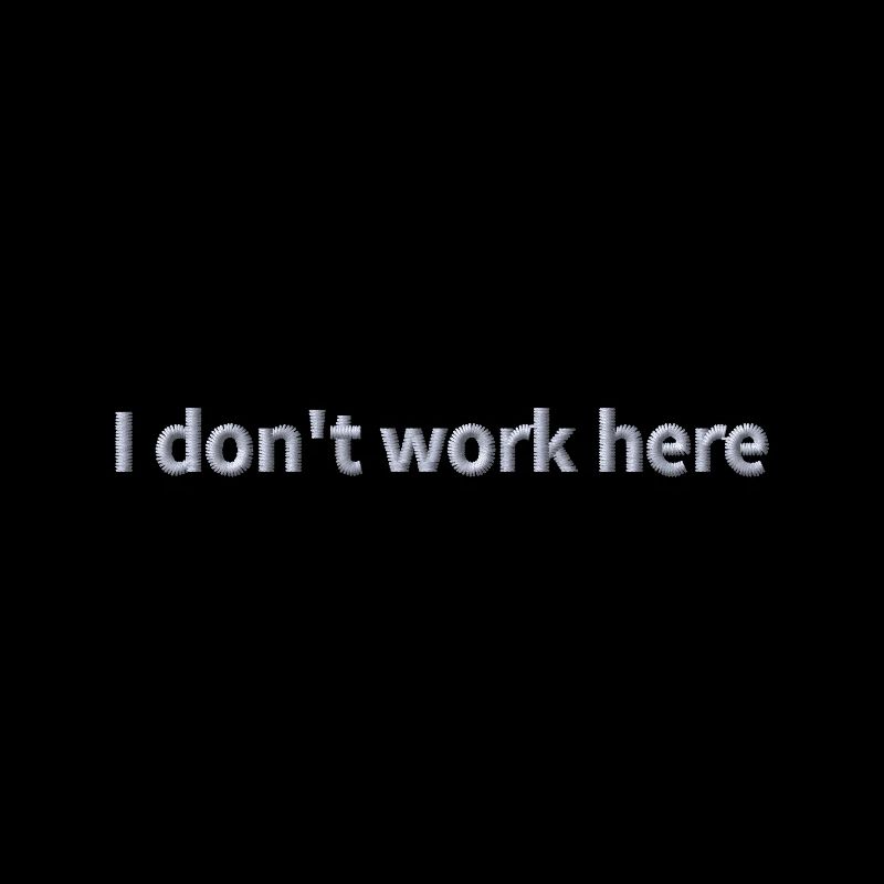 Statement "I don't work here" bestickt