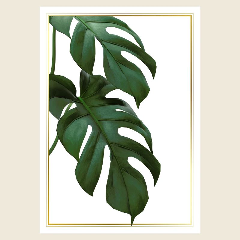 Feuilles tropicales de Monstera dans un cadre doré