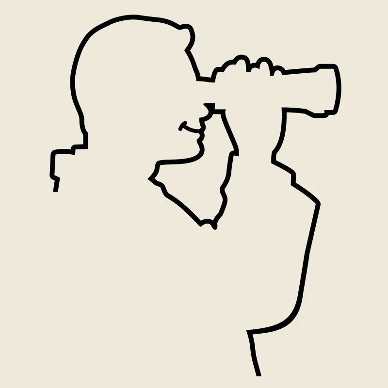 A man looks through his binoculars