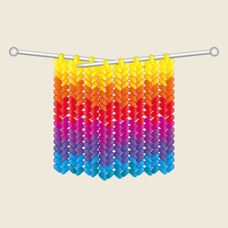 Knitted stitches in rainbow colours on needles