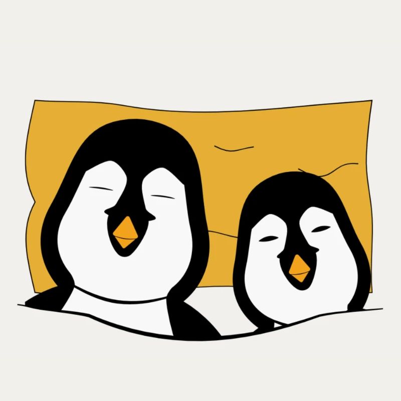 2 penguins in bed