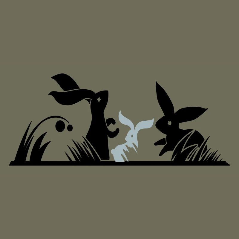 three rabbits in a meadow