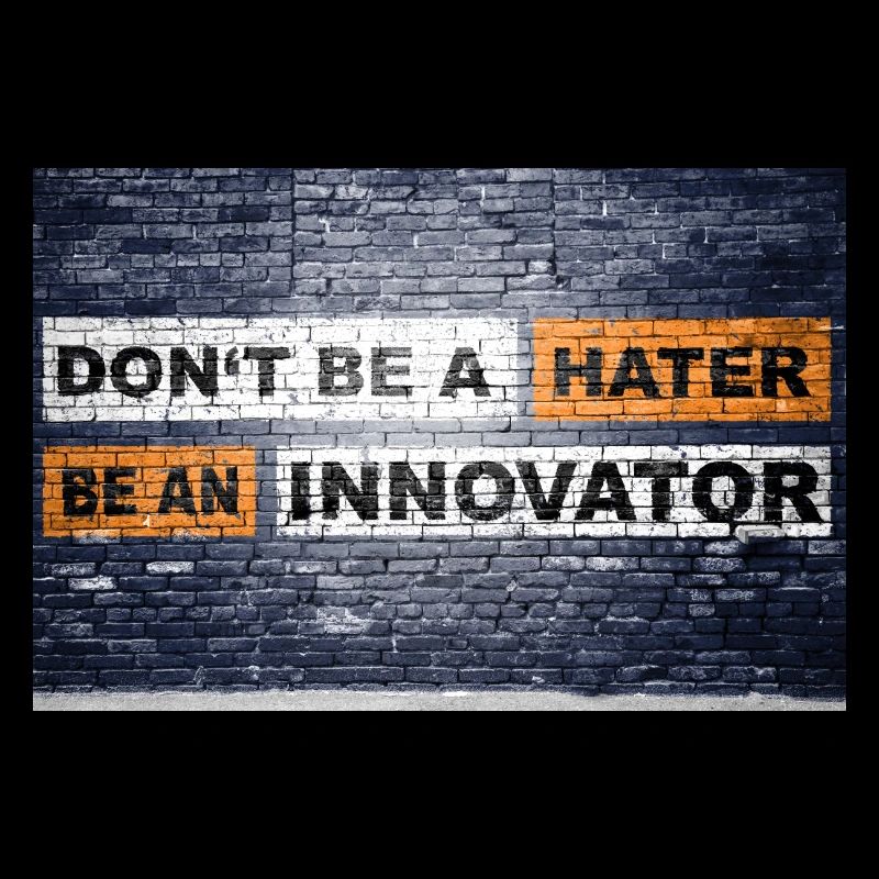 Don't be a hater be an innovator brick wall