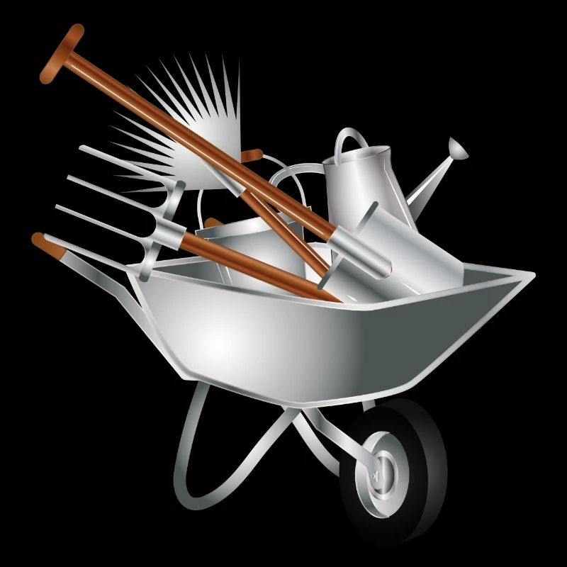 various garden tools in a wheelbarrow