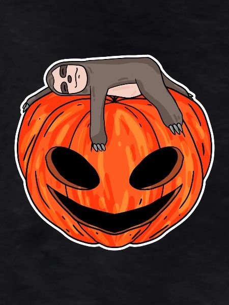 Sloth sleeping on pumpkin