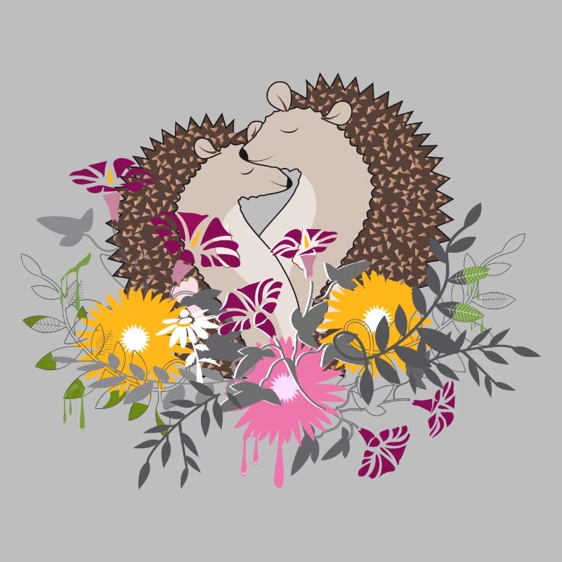 Deux petits hérissons assis ensemble dans le parterre de fleurs
