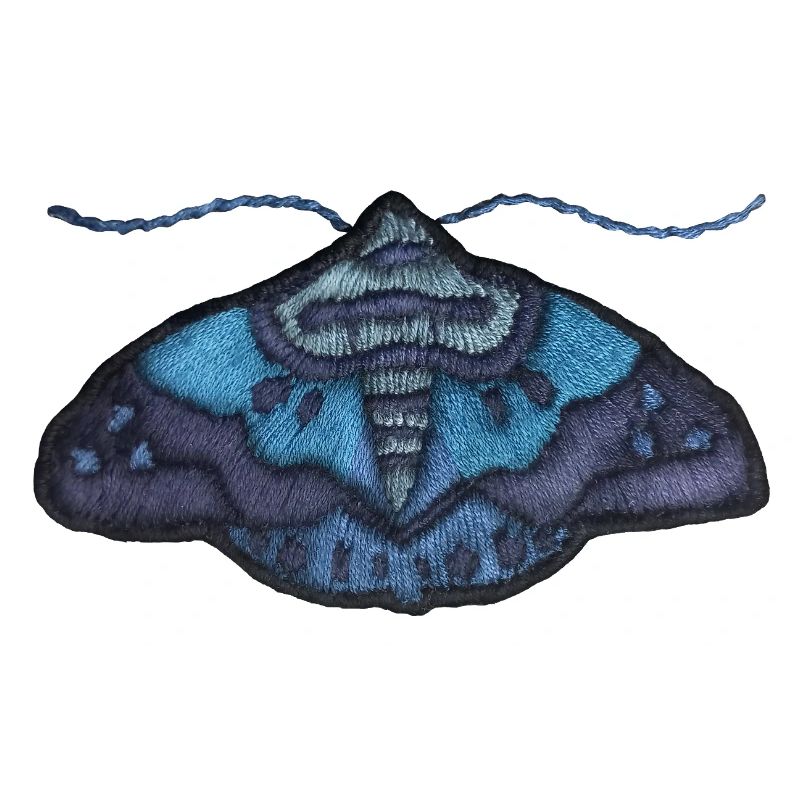 Blaue Motte – einzigartiges Stickmuster