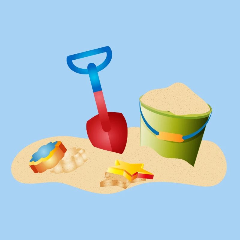 Jouets de sable sur la plage ou dans le bac à sable