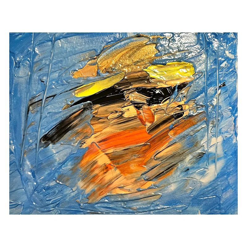 Blauer Farbwirbel im Orange