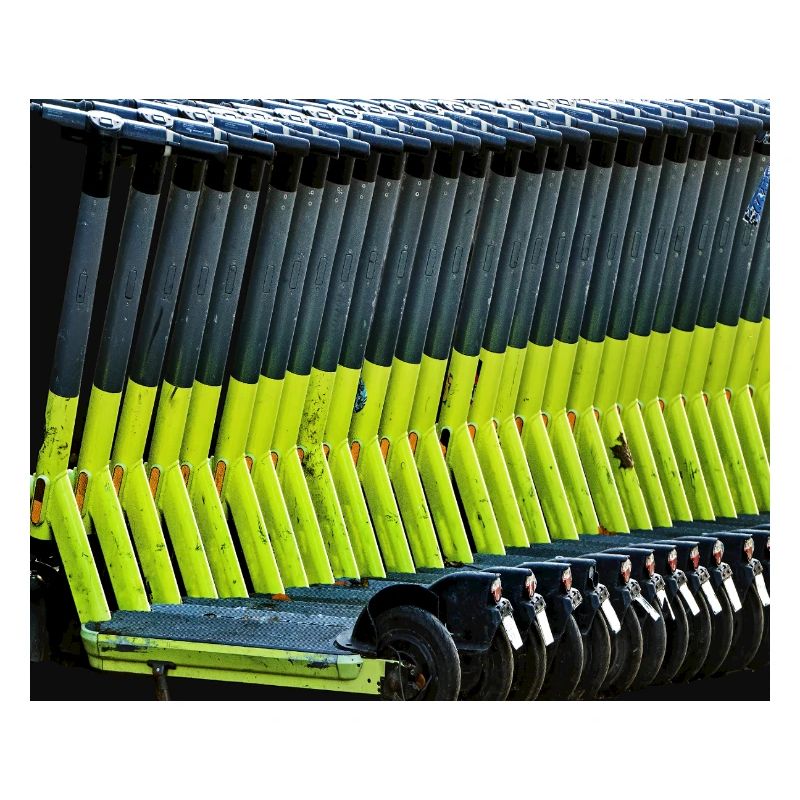 neon green e-scooters parked in row