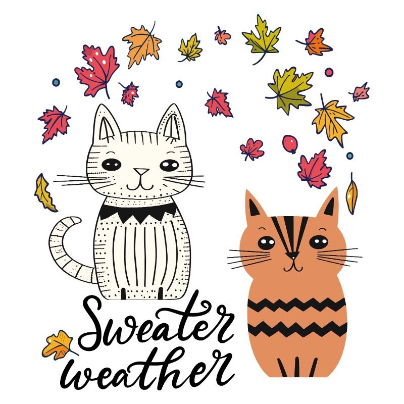 Chats dans les feuilles d'automne