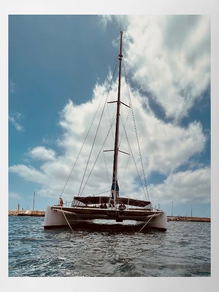 Sailing catamaran over the water