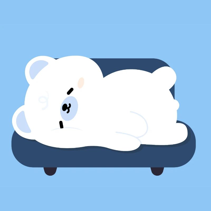 Tired Polar Bear on Sofa