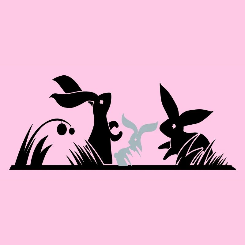three rabbits in a meadow