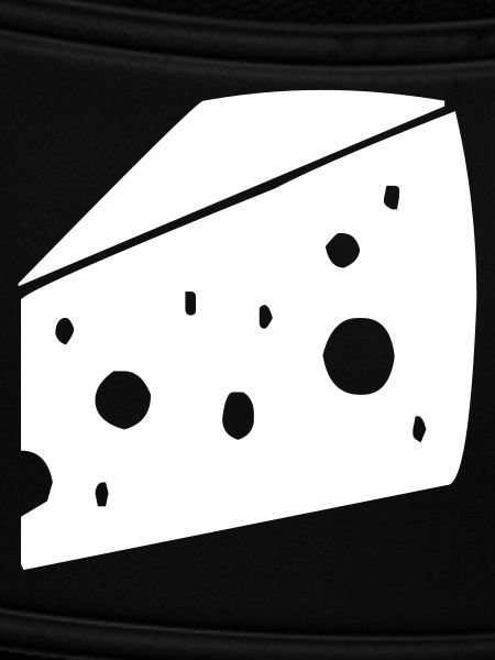 großes Stück Käse mit Löchern