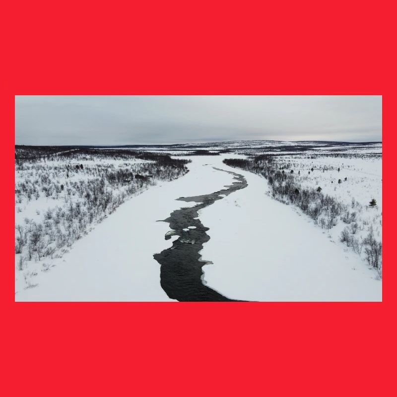 A winding river in a snowy landscape