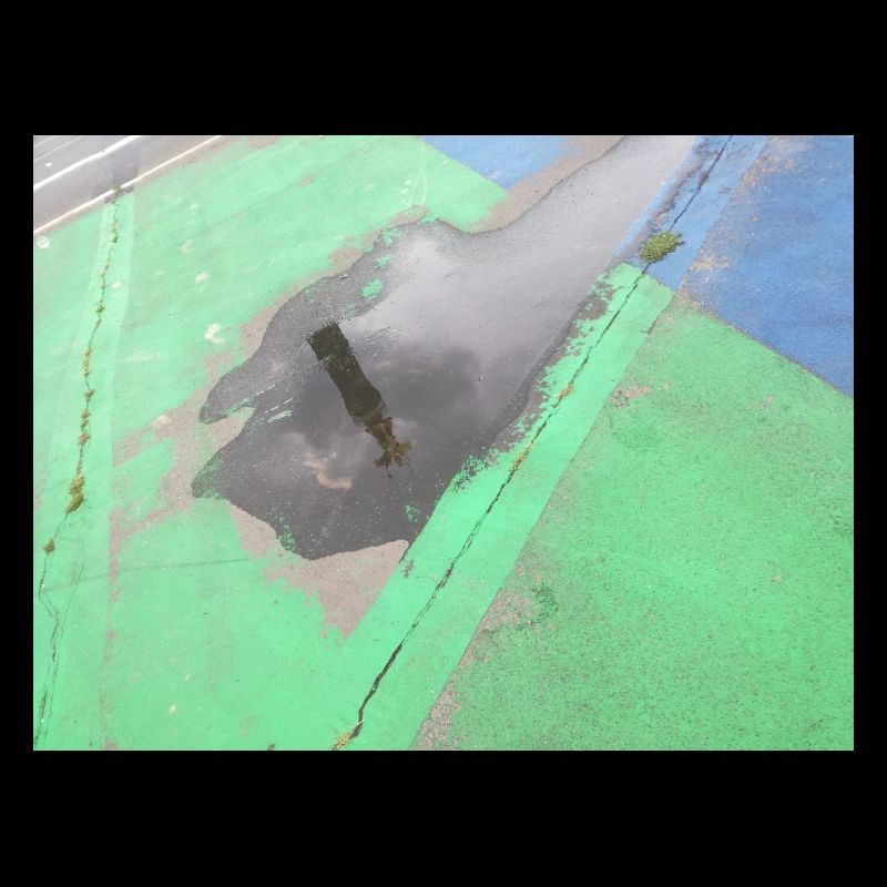CSD Berlin (mirrored Victory Column in the puddle)