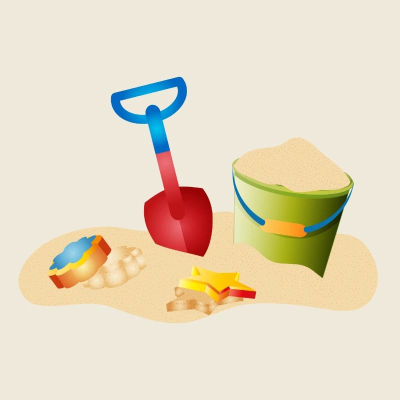 Jouets de sable sur la plage ou dans le bac à sable