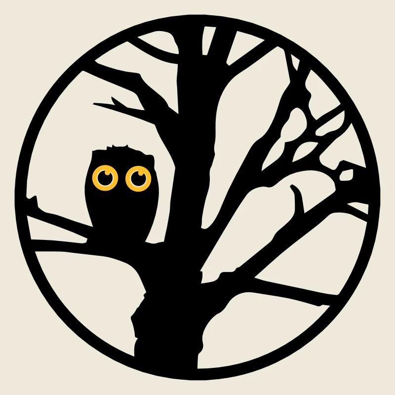 Un hibou assis sur un arbre