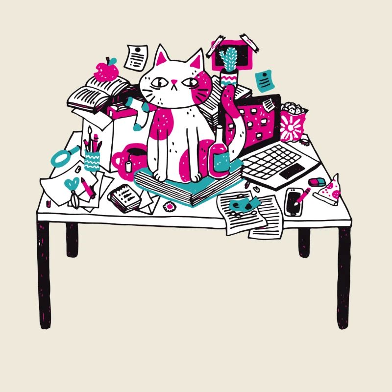 Cat on desk chaos