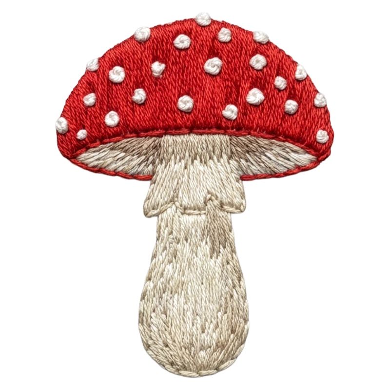 Rouge champignon blanc dans un aspect brodé (imprimé)
