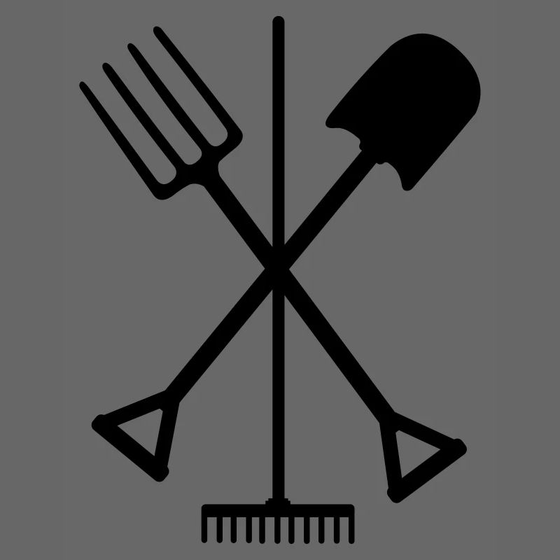 Garden tools shovel rake and pitchfork crossed