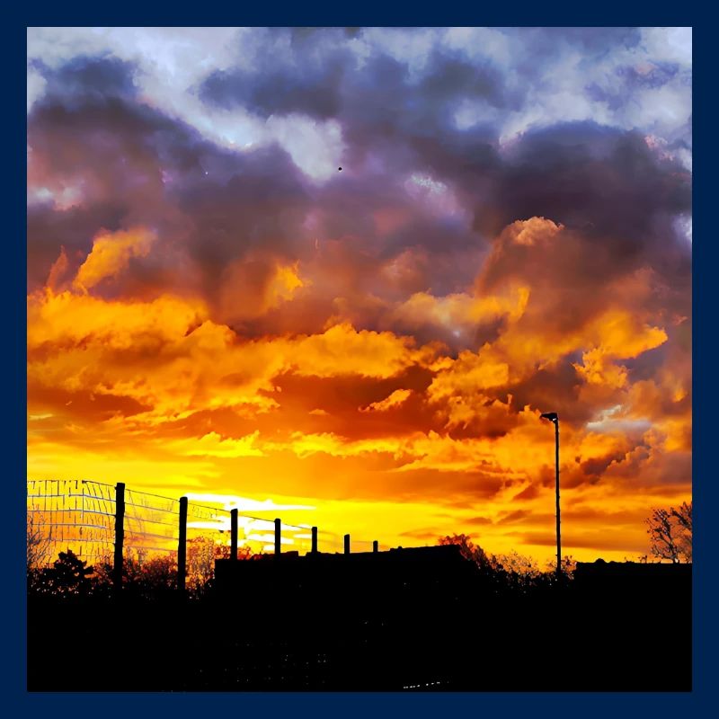Coucher de soleil – Couleurs de feu dans le ciel du soir
