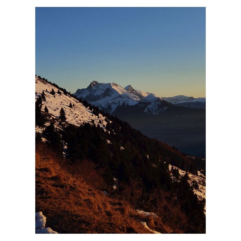 Sunset over snow-capped peaks