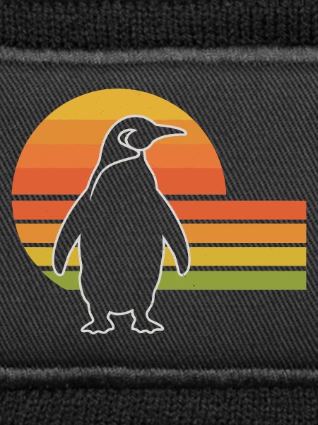 Penguin silhouette sunset design