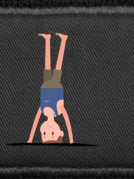 Man boy does headstand