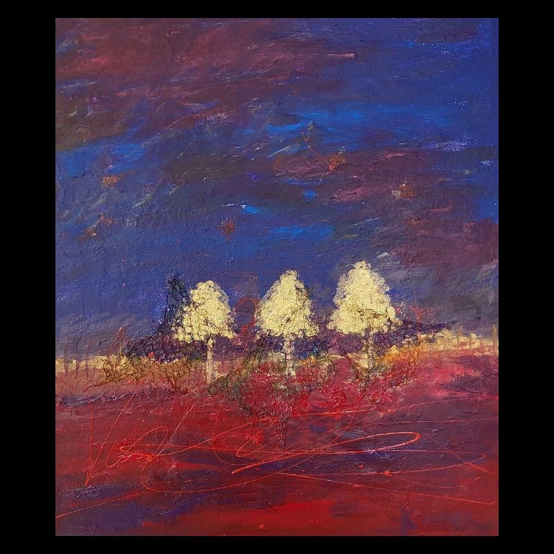 Three trees in sunset