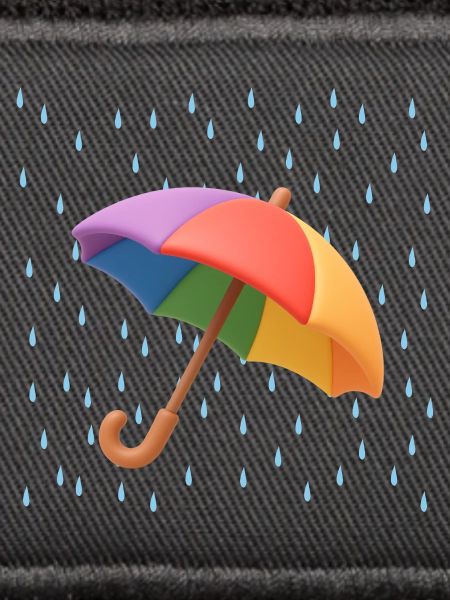 Regenbogen Regenschirm im Regen