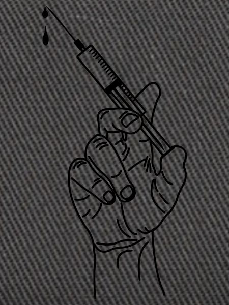 Impfspritze in der Hand