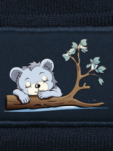 Kuschelbär am Ast