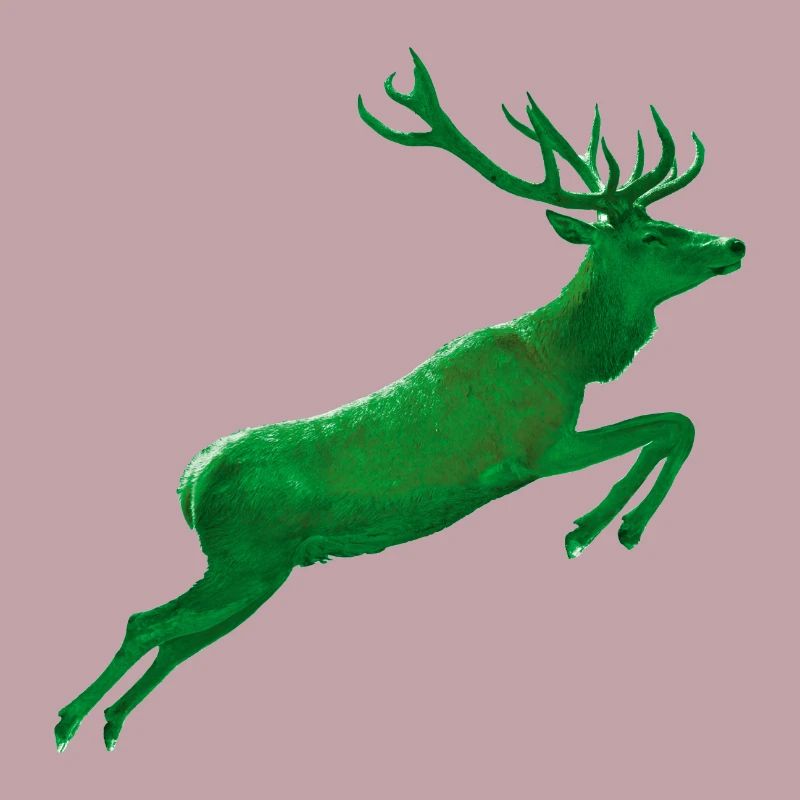 Le cerf saute dans le vert