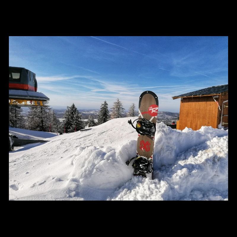 Snowboarding on a sunny slope