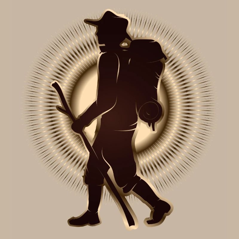 Pilgrim or hiker with walking stick & backpack