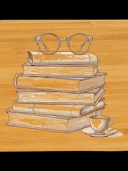 Stack of books with glasses