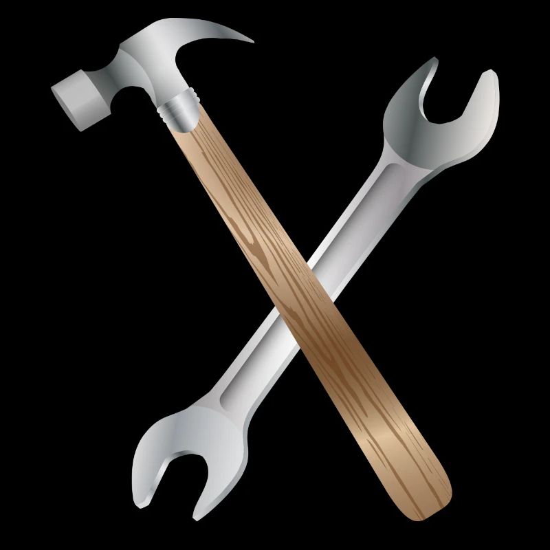 Clé à molette et marteau de charpentier