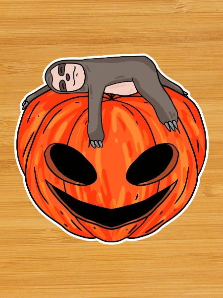 Sloth sleeping on pumpkin