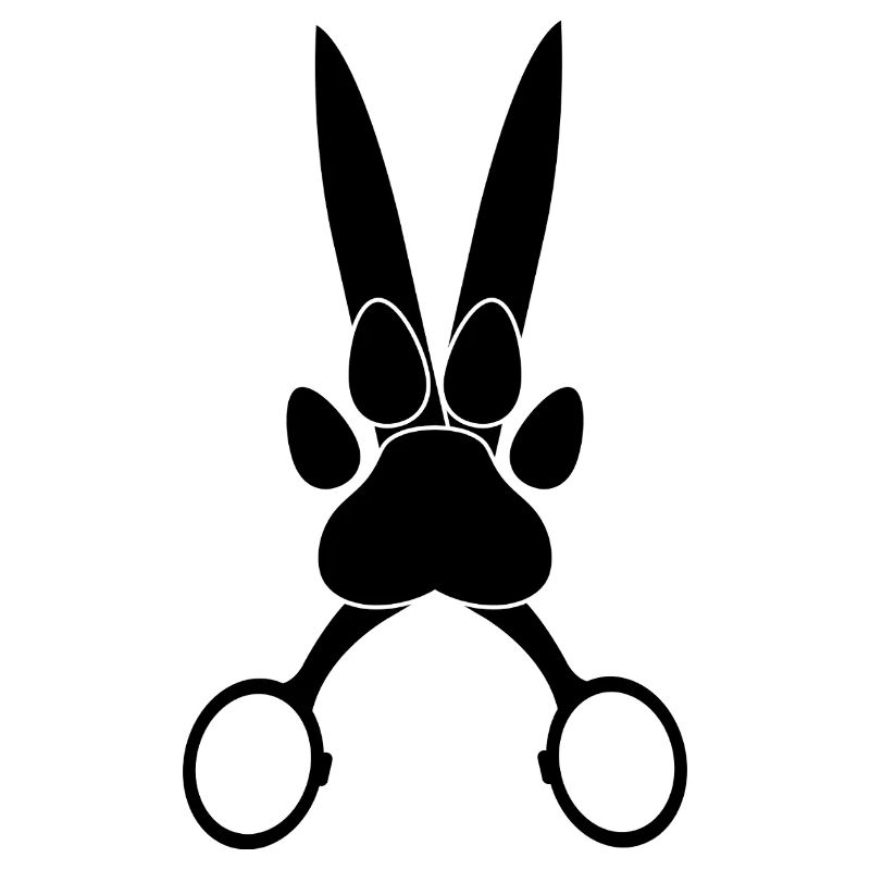 Patte de chien sur ciseaux