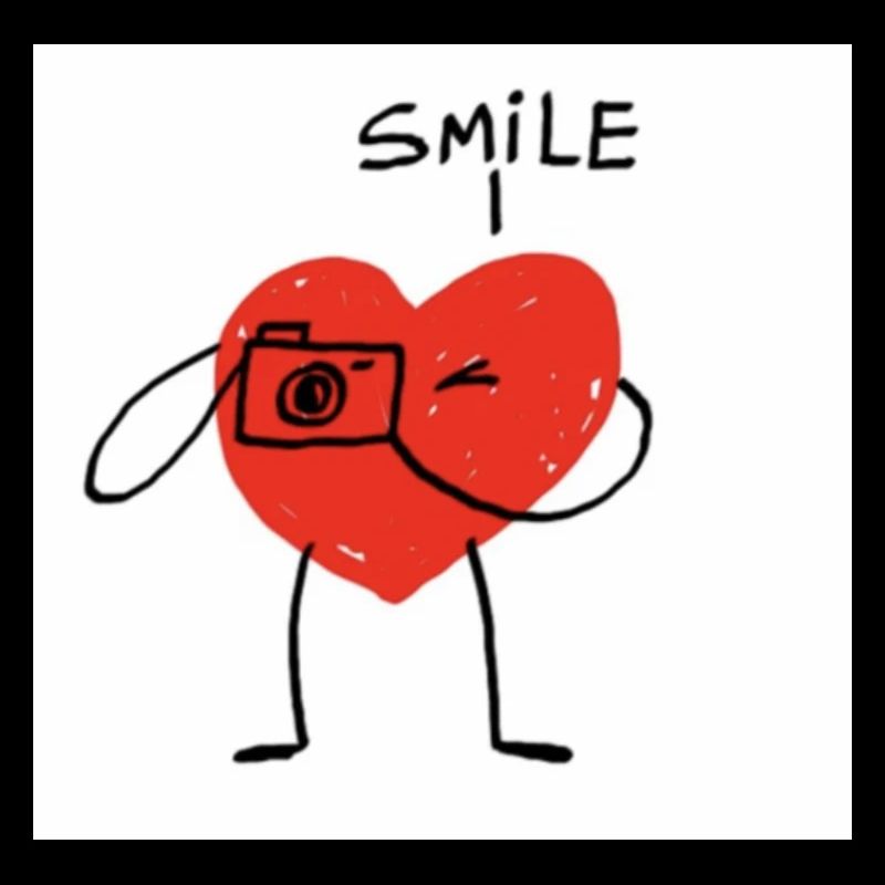 Coeur avec caméra dessin animé