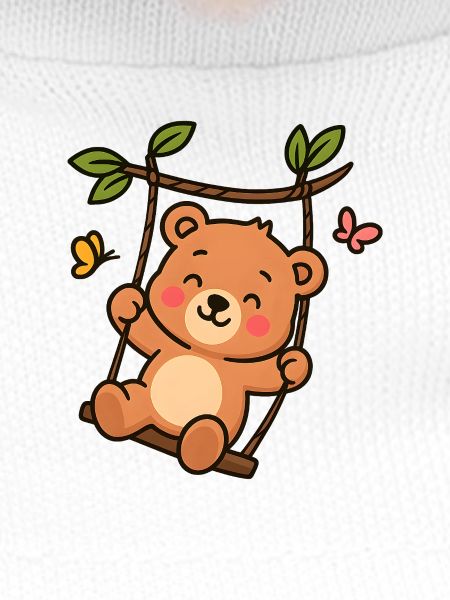 Little bear on swing