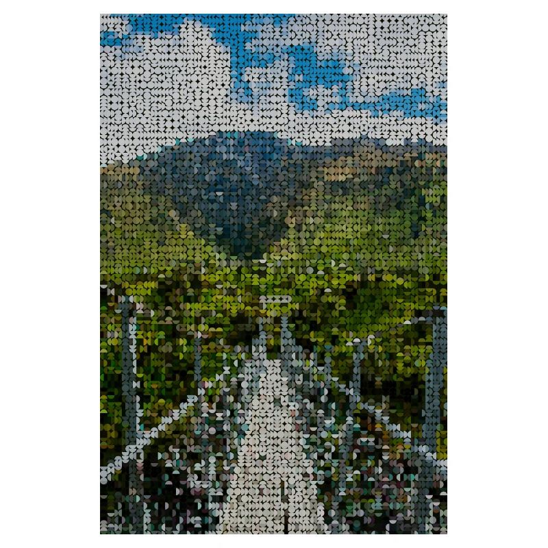 Path through green mountain landscape